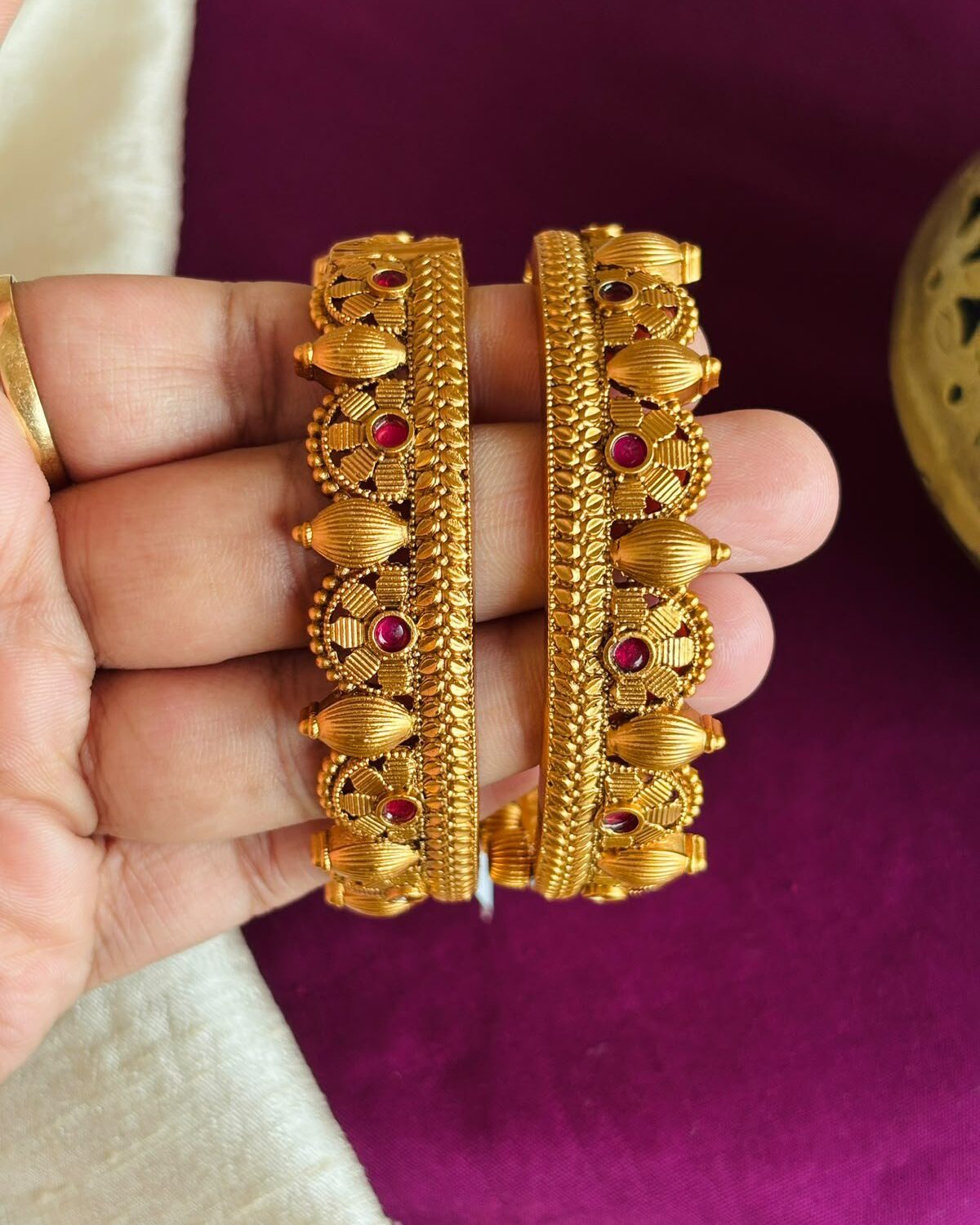 gold polish pichudi bangles.