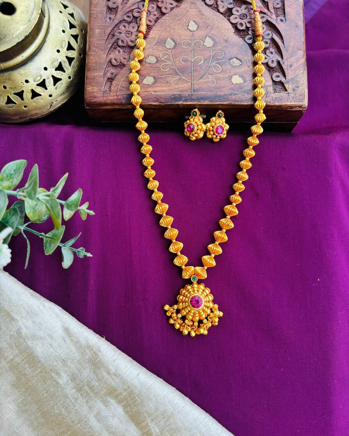 Beads Mala beautiful pair of earrings matching to its pendant.