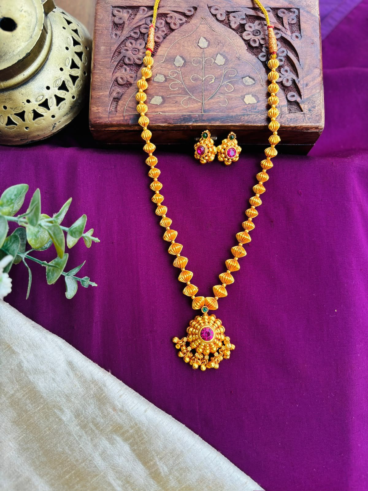 Beads Mala beautiful pair of earrings matching to its pendant.