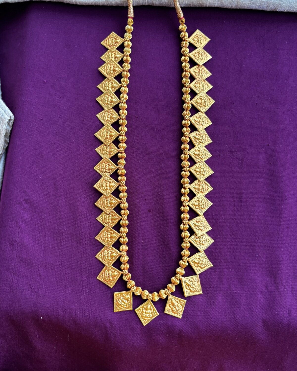 Chaukon Laxmi long with earrings