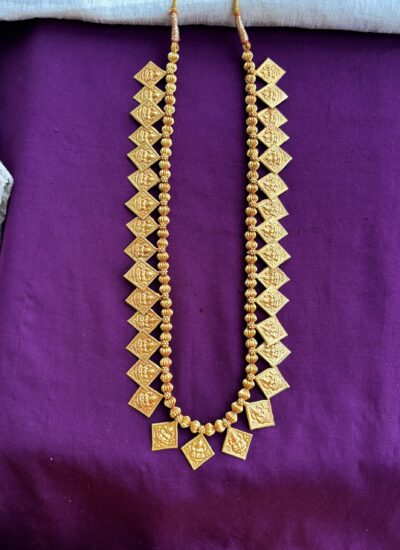 Chaukon Laxmi long with earrings